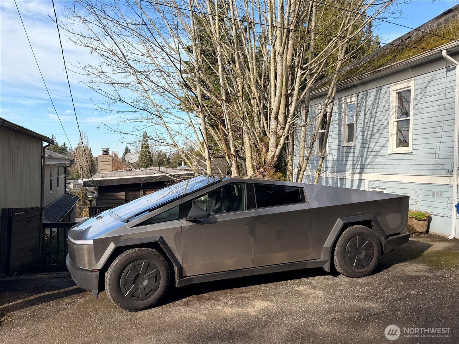 3217 East Madison Street Seattle, WA 98112 - Photo 36 of 40 a view of a car parked in front of a house