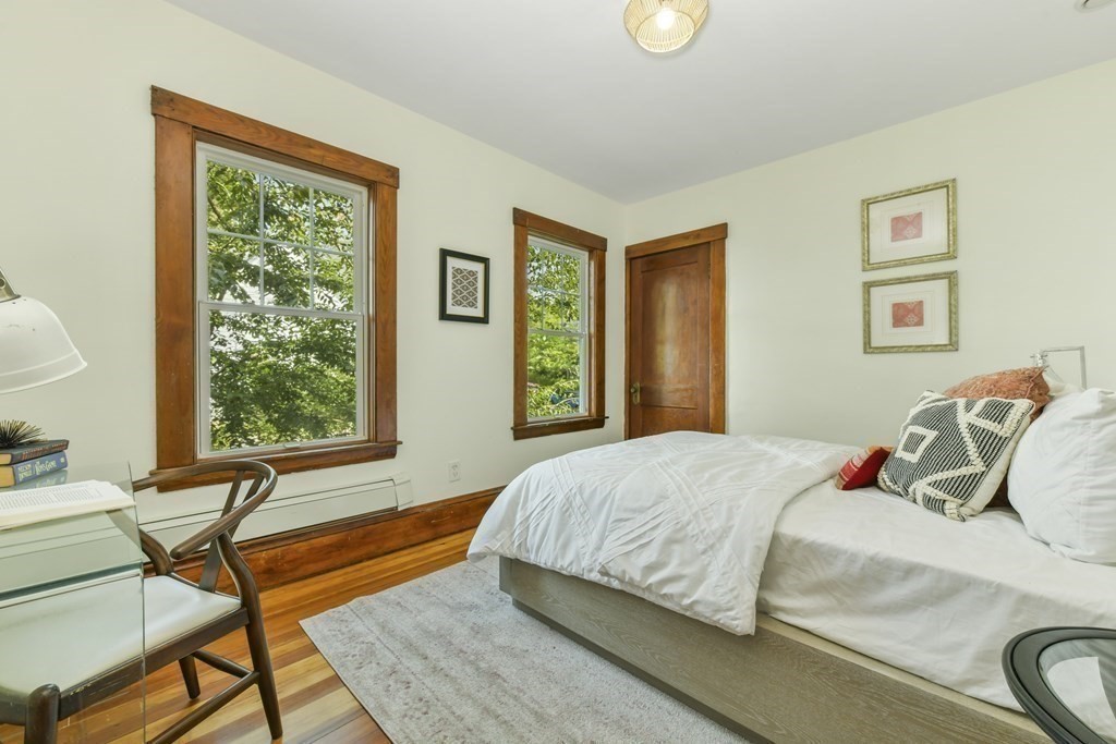 46 Spring Street, Unit 2 Somerville, MA 02143 - Photo 19 of 22 a bedroom with a bed and a window