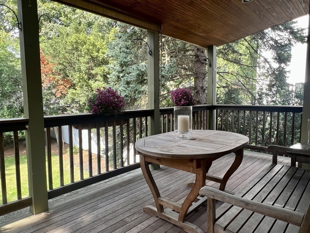 46 Spring Street, Unit 2 Somerville, MA 02143 - Photo 5 of 22 a view of a two chairs in the deck