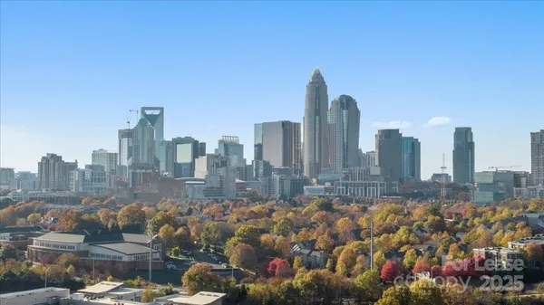 a view of a city with tall buildings