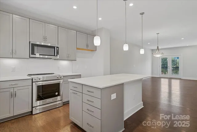 a view of a balcony with wooden floor and stairs