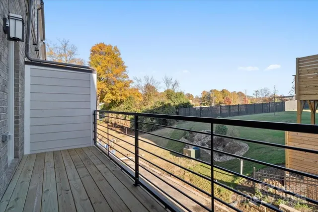 a bathroom with a sink toilet and a mirror