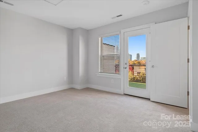 a bathroom with a sink toilet vanity and tub