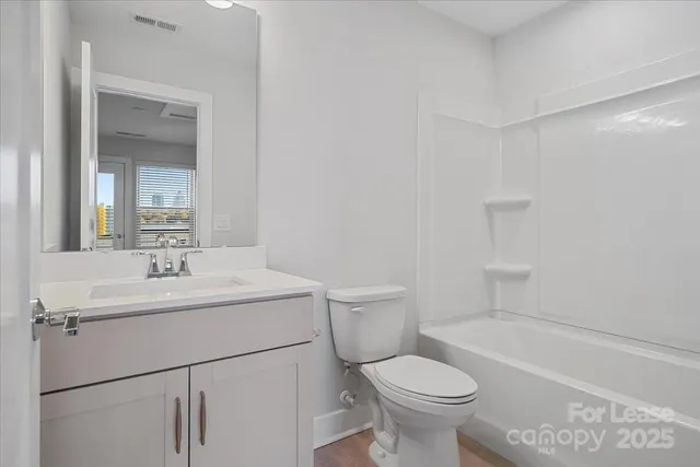 a view of a balcony with city view