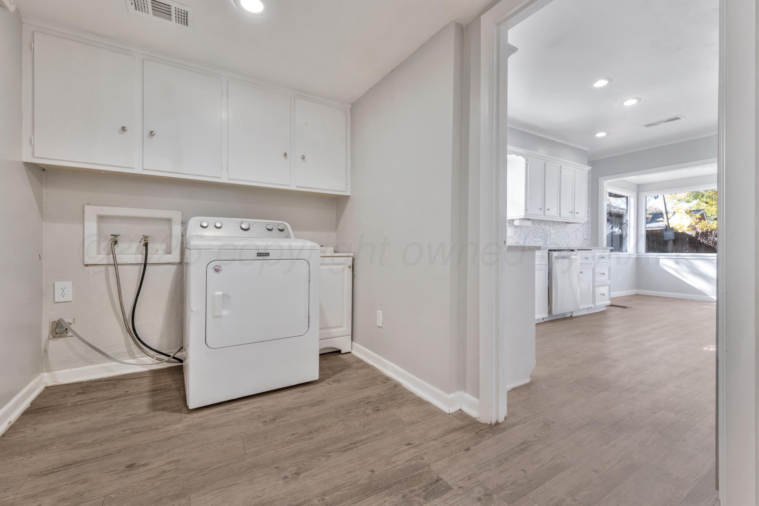 3700 Paramount Boulevard Amarillo, TX 79109 - Photo 32 of 40 a view of kitchen with white cabinets