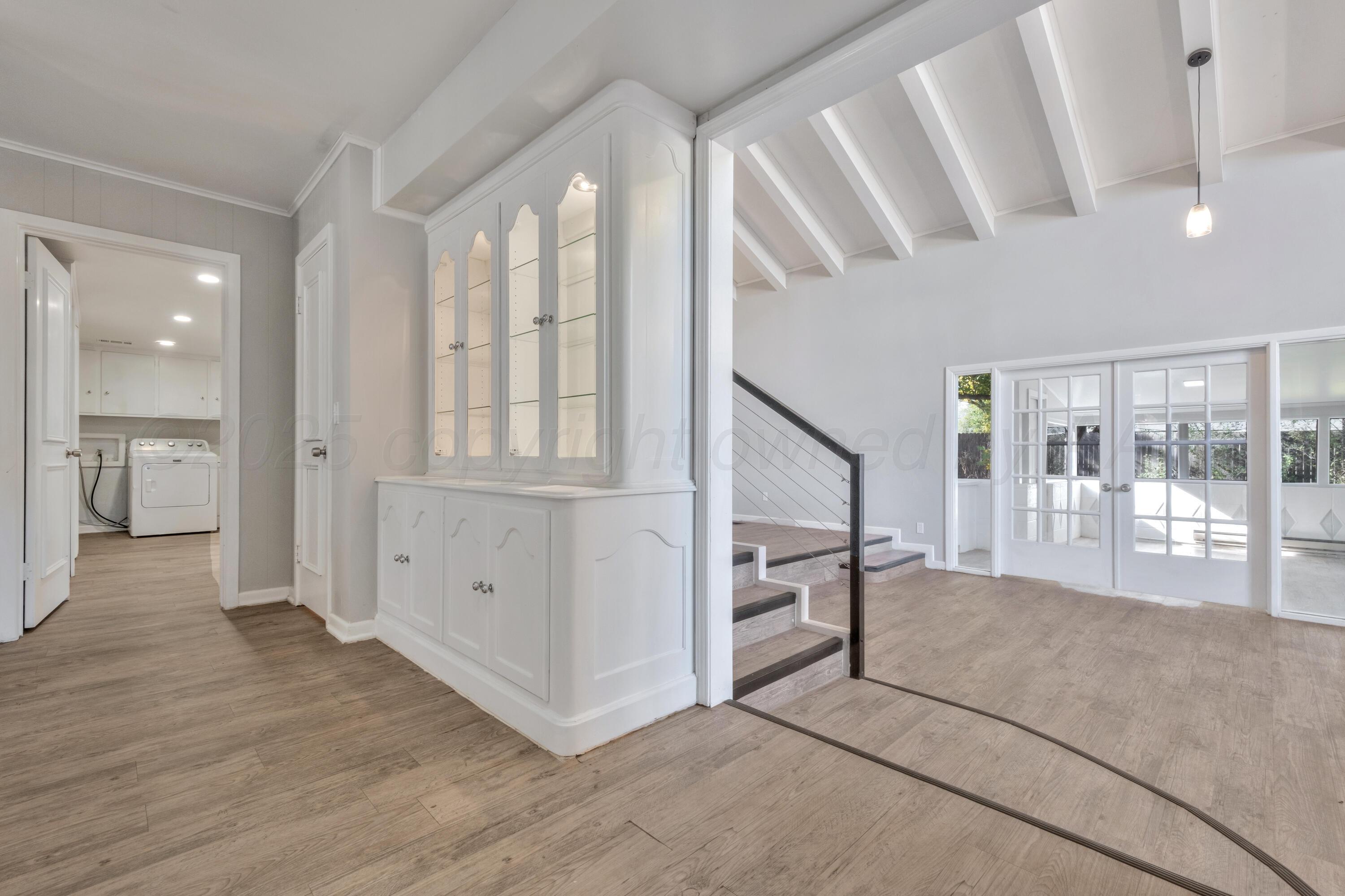 3700 Paramount Boulevard Amarillo, TX 79109 - Photo 4 of 40 a view of an entryway with wooden floor