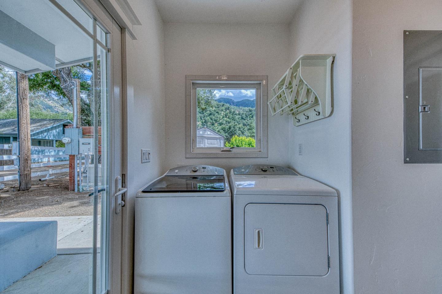 47317 Arroyo Seco Road Greenfield, CA 93927 - Photo 27 of 47 a utility room with a window dryer and washer