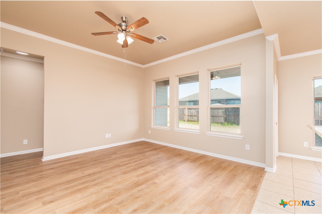 8020 Hawthorn Temple, TX 76502 - Photo 14 of 21 a view of an empty room with a window and a ceiling fan
