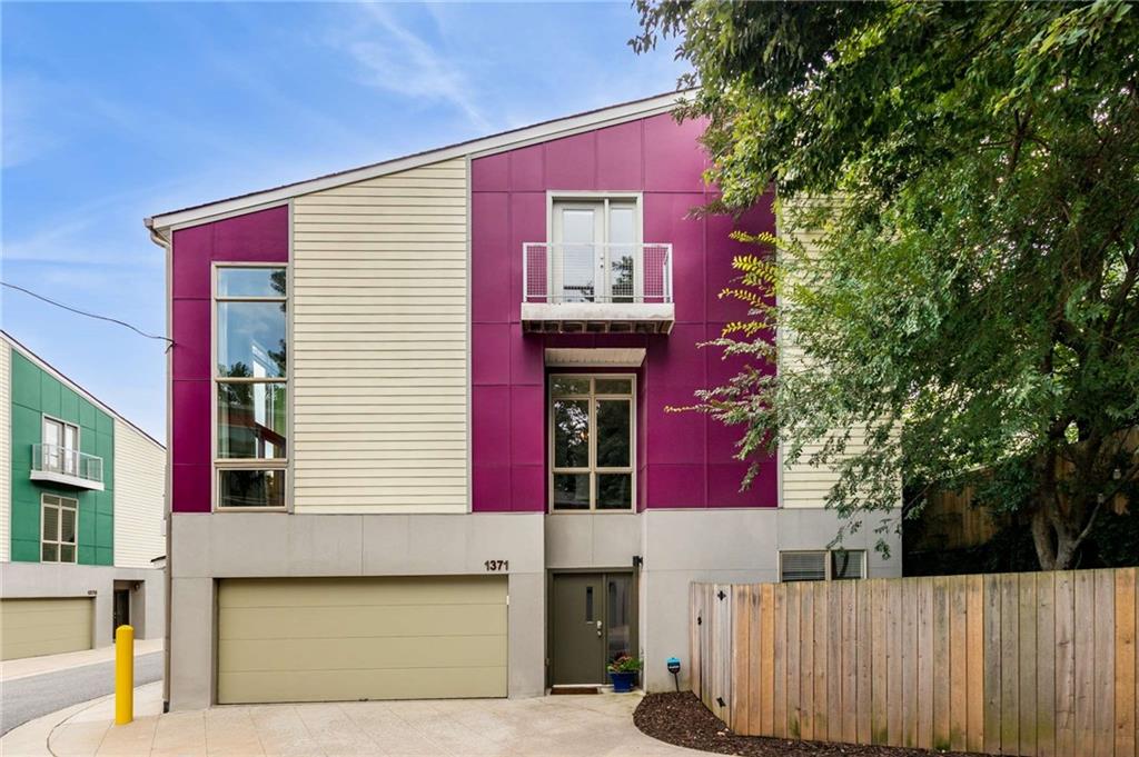 1371 Rietveld Row Northwest Atlanta, GA 30318 - Photo 1 of 1 a view of a house with a street