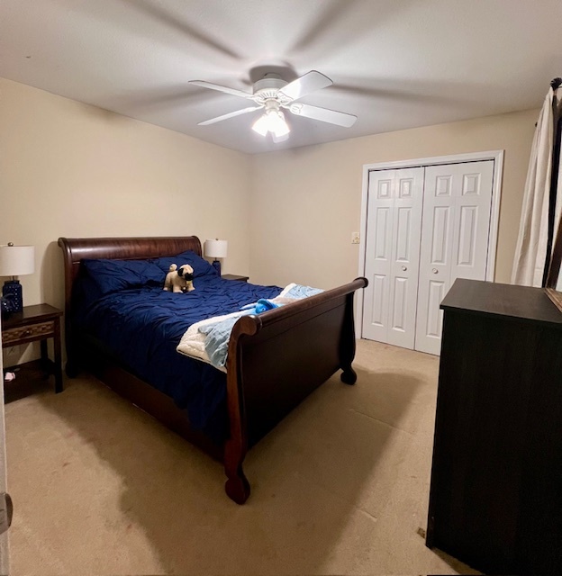 409 East Congress Avenue Rantoul, IL 61866 - Photo 2 of 20 a bed sitting in a bedroom next to a window