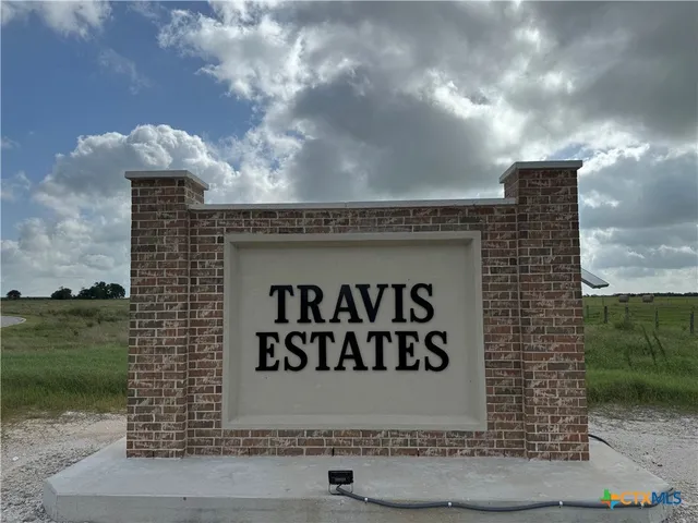 a sign broad on the side of a road