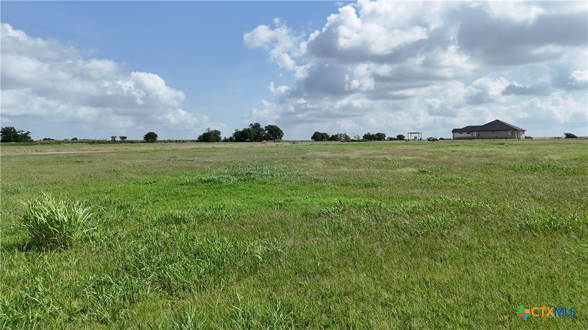 Tbd Tbd Cougar Lane Lott, TX 76656 - Photo 8 of 9 a view of a lake and green space