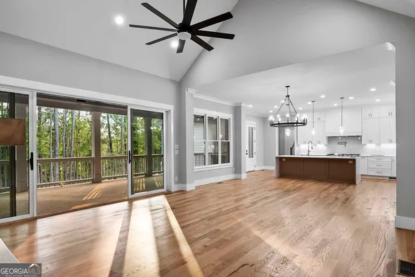 a white bath tub sitting next to a white sink