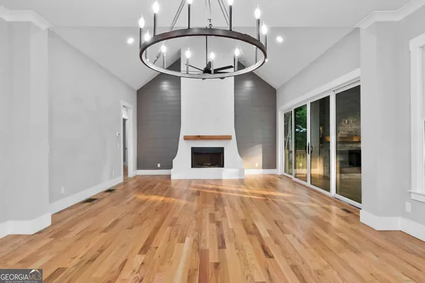 a view of staircase with white walls and windows
