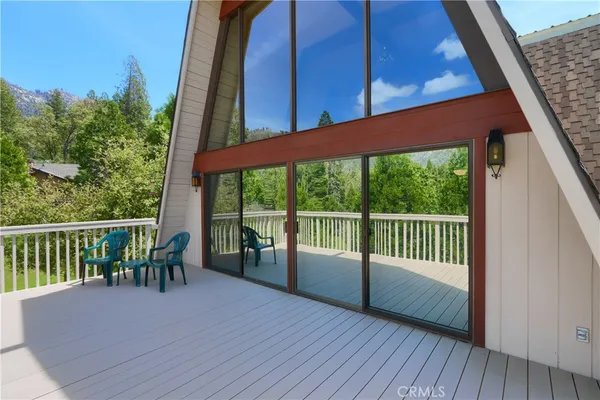a view of a glass door of the house