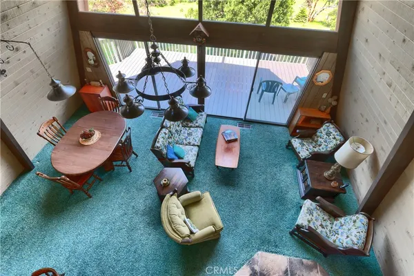 a bedroom with a bed and a chair