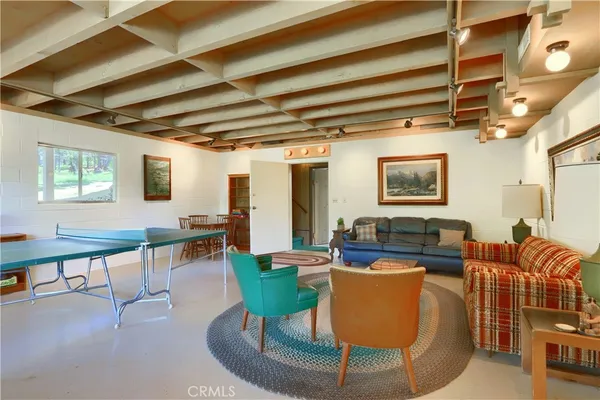 a view of a garden with a house