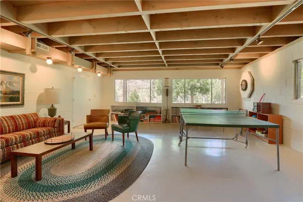 a view of a garden with a building in the background