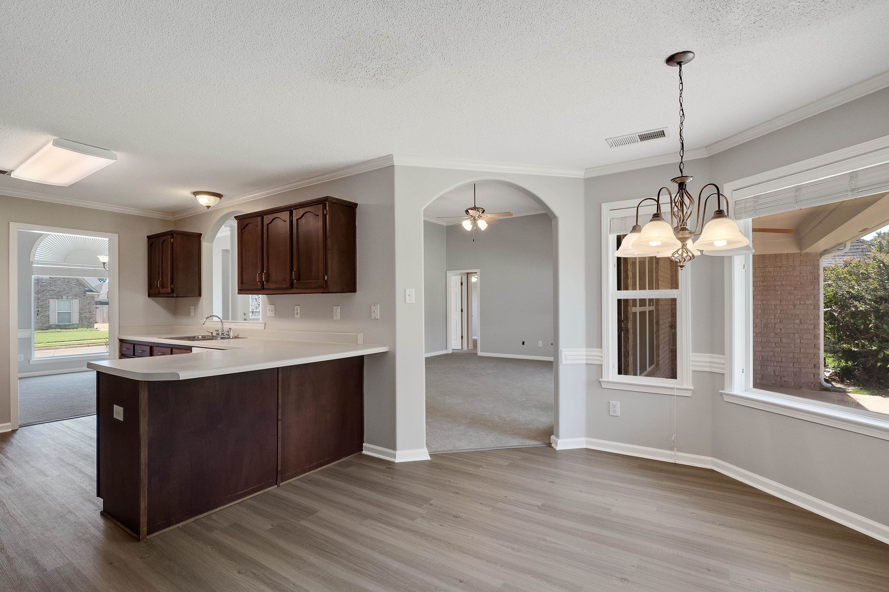 1171 Macon Hall Road Cordova, TN 38018 - Photo 12 of 35 a view of kitchen with sink microwave and refrigerator