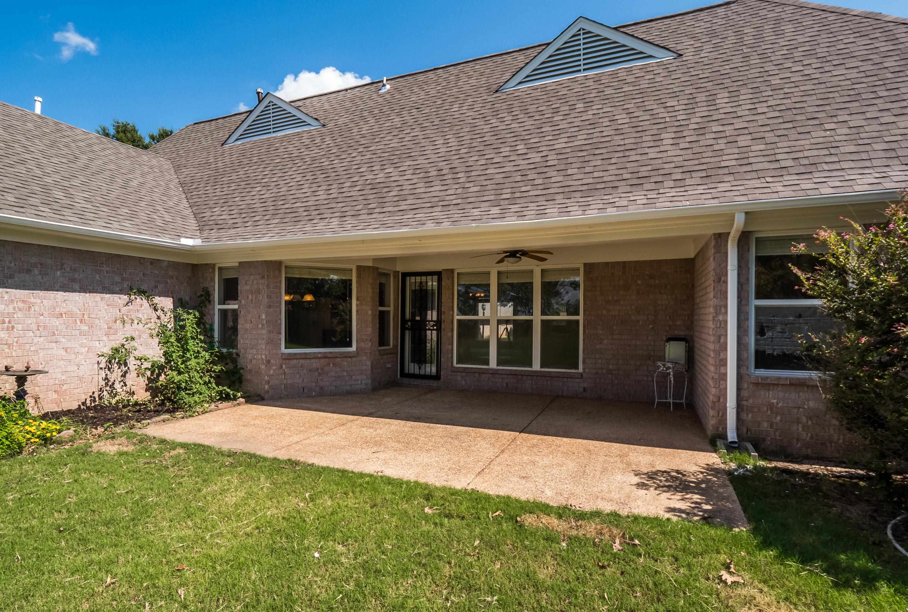 1171 Macon Hall Road Cordova, TN 38018 - Photo 28 of 35 a view of a house with a garden