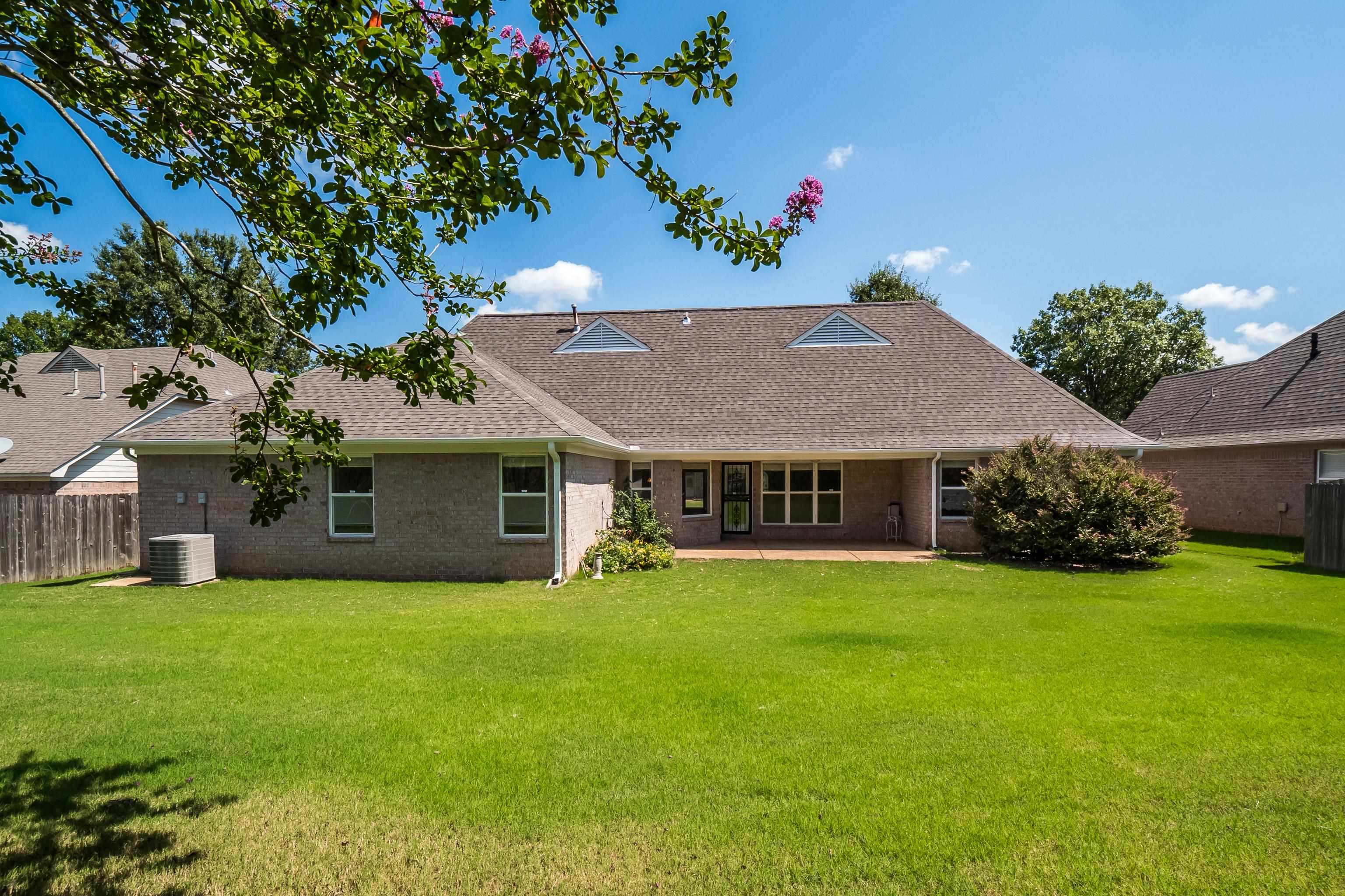 1171 Macon Hall Road Cordova, TN 38018 - Photo 31 of 35 a front view of house with yard and green space