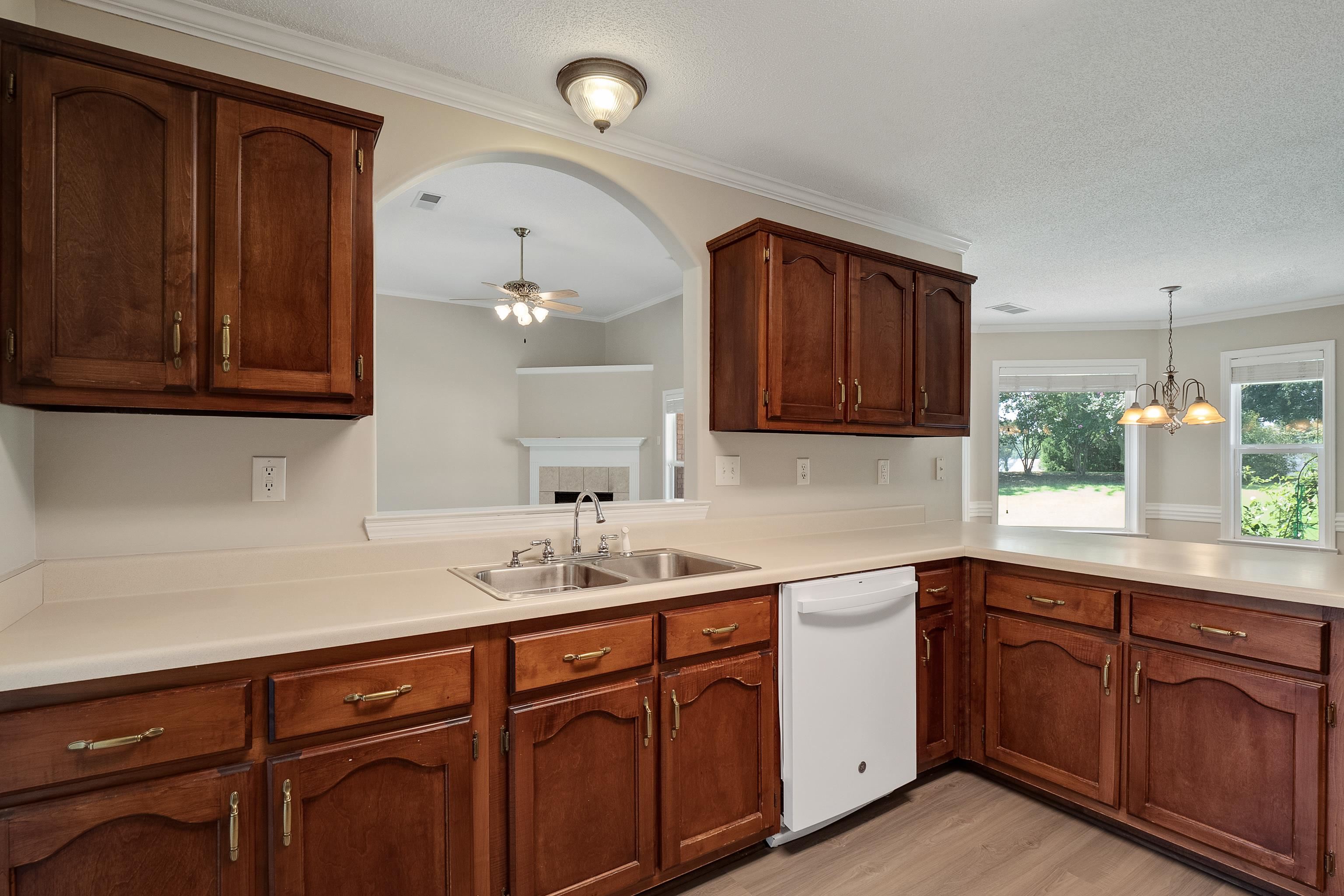 1171 Macon Hall Road Cordova, TN 38018 - Photo 10 of 35 a kitchen with sink and cabinets