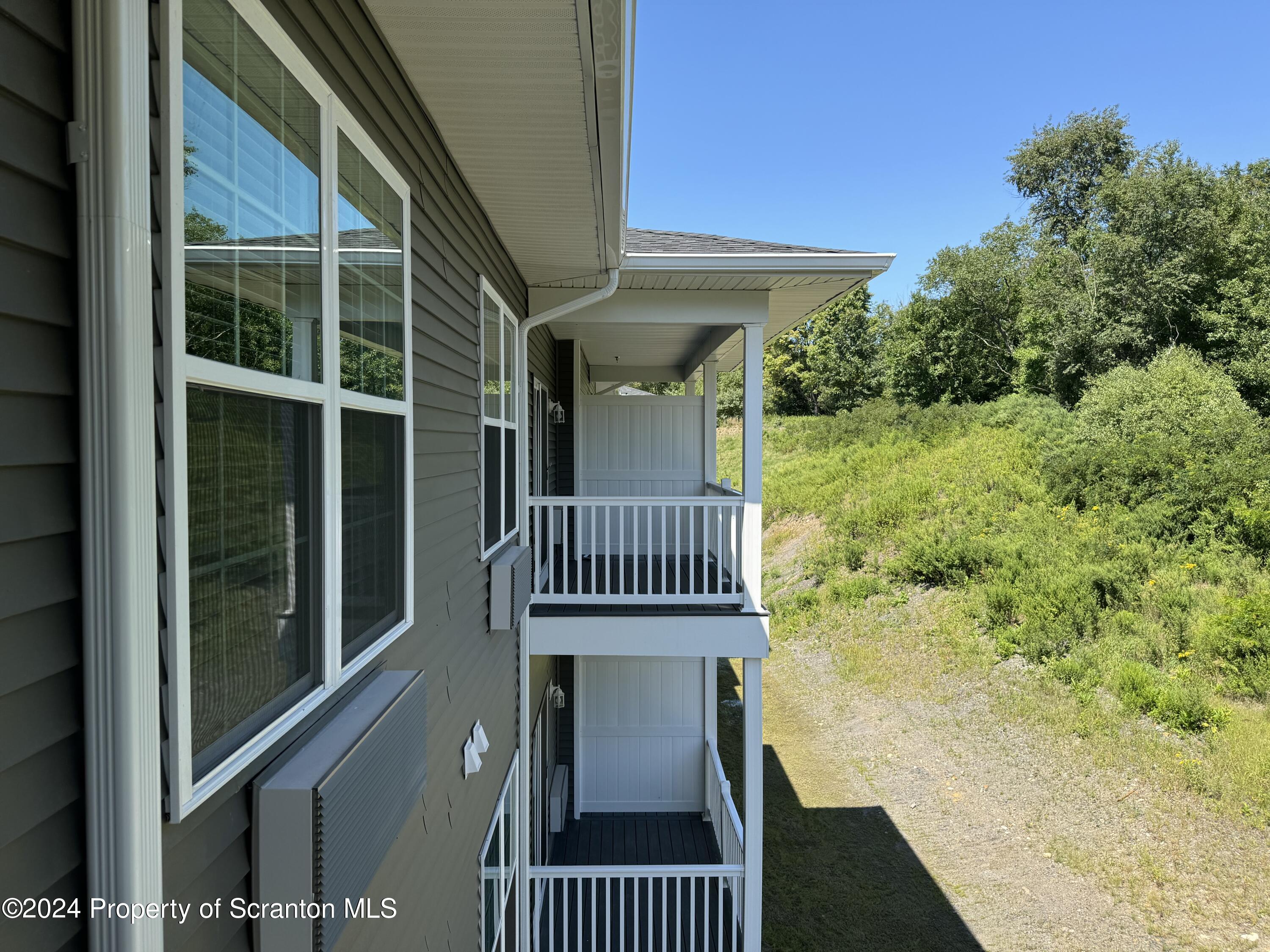 104 Circle Drive Taylor, PA 18517 - Photo 19 of 31 a view of a balcony with a swing