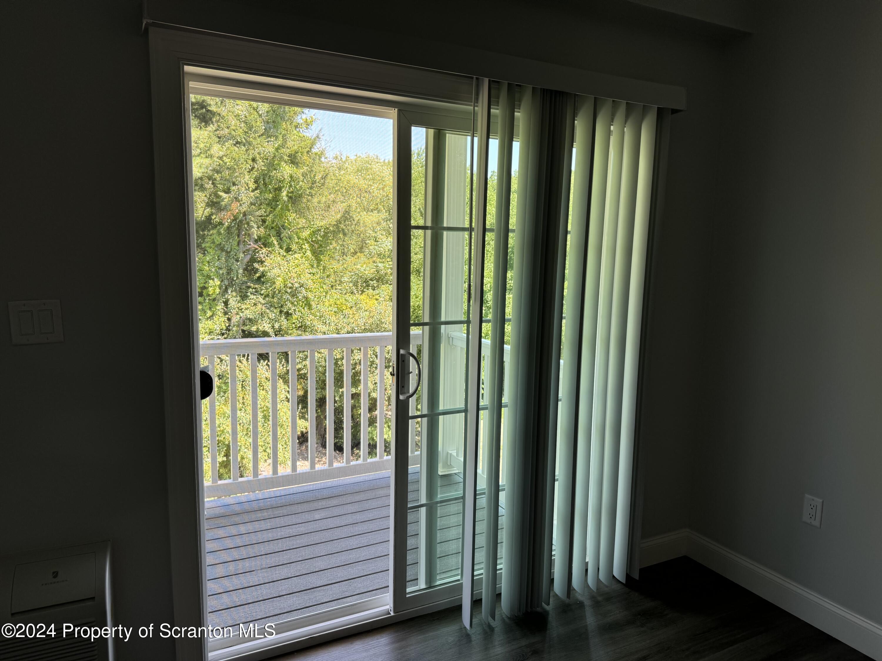 104 Circle Drive Taylor, PA 18517 - Photo 26 of 31 a view of a large mirror next to a window