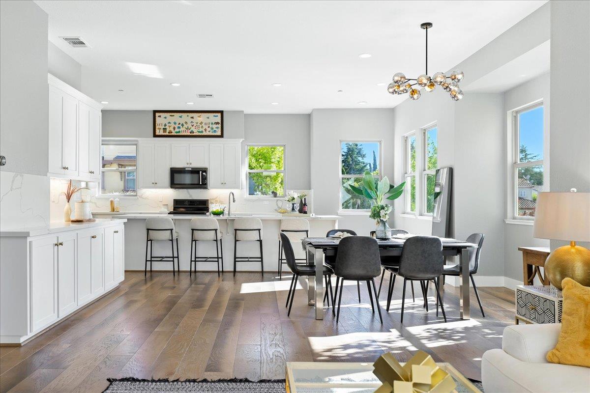 324 Cherokee Loop Mountain View, CA 94043 - Photo 12 of 62 a view of a dining room with furniture window and wooden floor