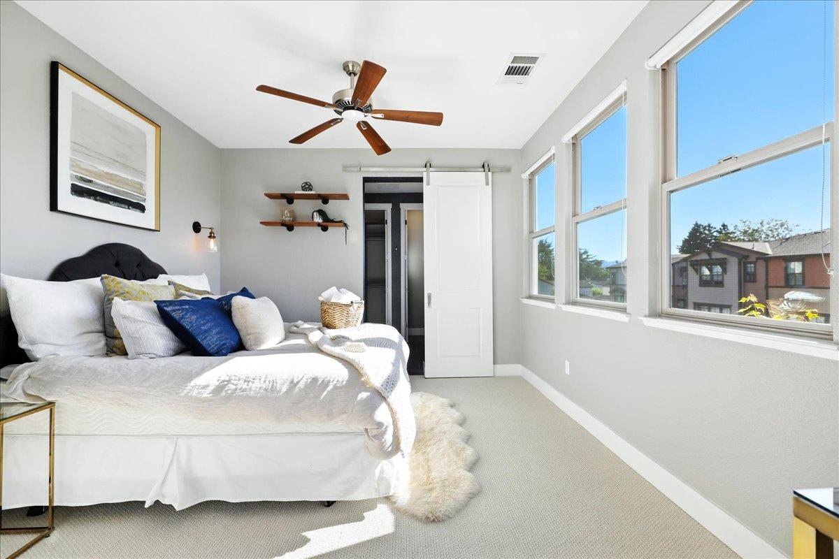 324 Cherokee Loop Mountain View, CA 94043 - Photo 28 of 62 a bedroom with a large bed and a large window