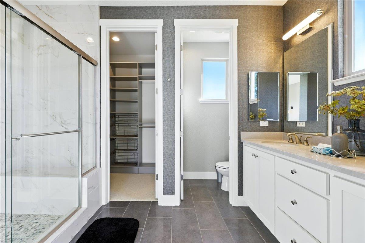324 Cherokee Loop Mountain View, CA 94043 - Photo 35 of 62 a bathroom with a granite countertop sink toilet and shower