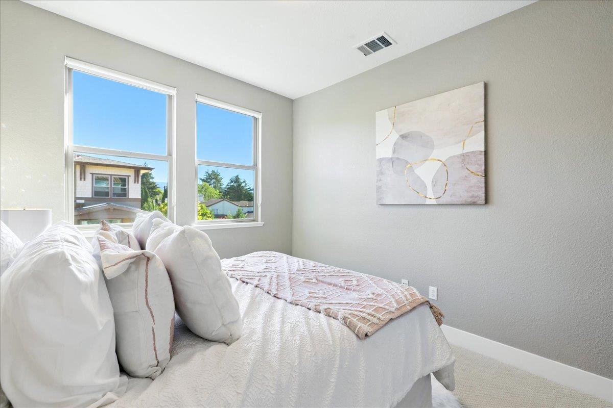 324 Cherokee Loop Mountain View, CA 94043 - Photo 38 of 62 a bedroom with a bed and a large window