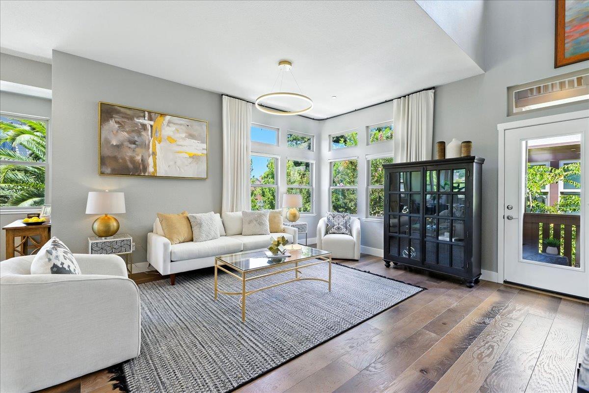 324 Cherokee Loop Mountain View, CA 94043 - Photo 4 of 62 a living room with furniture large window and wooden floor