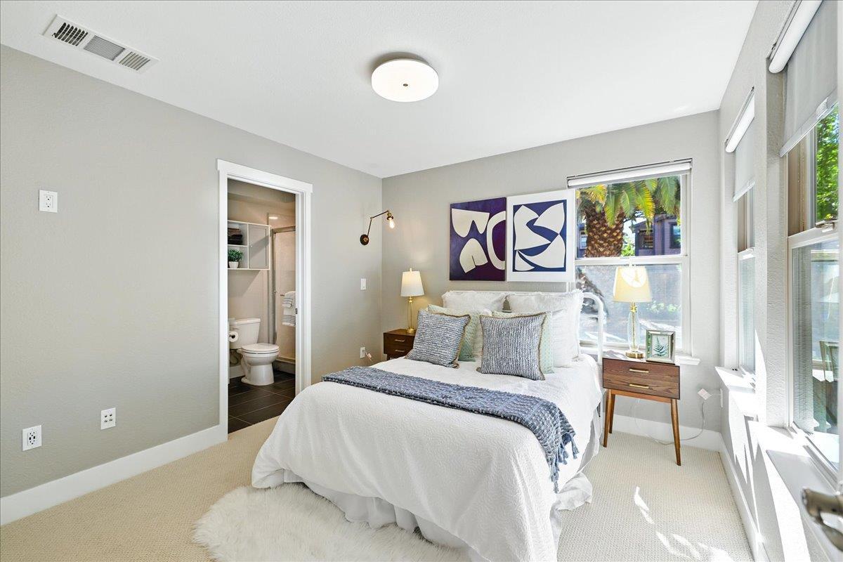 324 Cherokee Loop Mountain View, CA 94043 - Photo 41 of 62 a bedroom with a bed and a painting on the wall