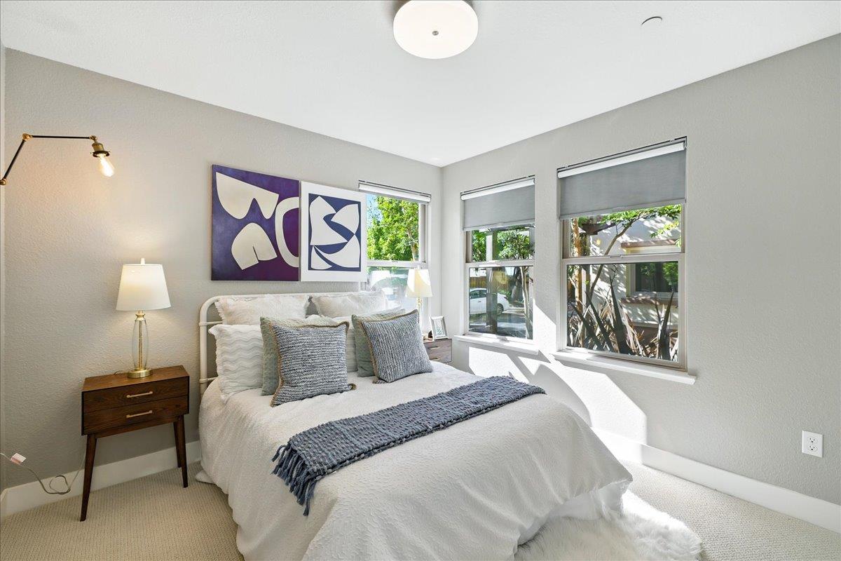 324 Cherokee Loop Mountain View, CA 94043 - Photo 42 of 62 a bedroom with a bed and a painting on the wall