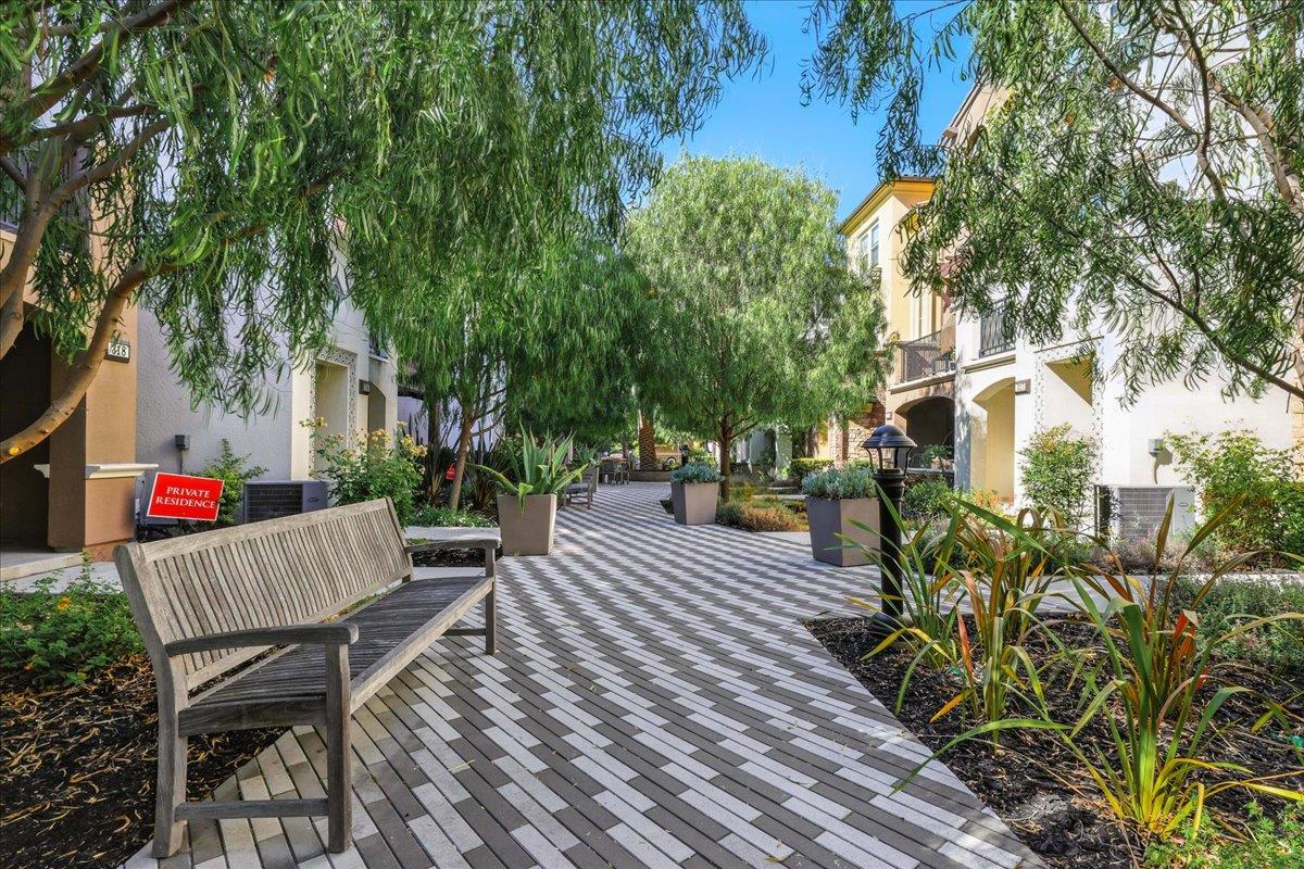 324 Cherokee Loop Mountain View, CA 94043 - Photo 51 of 62 a view of a patio with table and chairs and potted plants