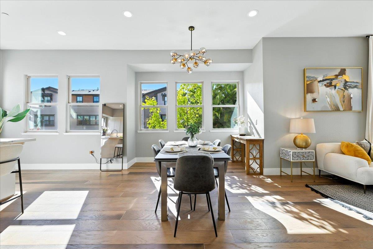 324 Cherokee Loop Mountain View, CA 94043 - Photo 10 of 62 a living room with furniture and a chandelier