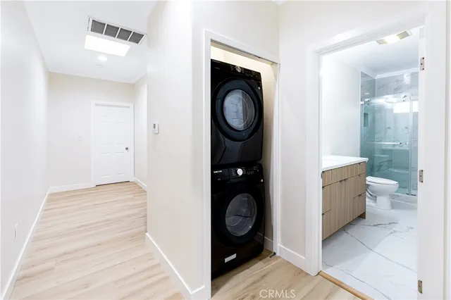 a view of bathroom with a toilet and a sink
