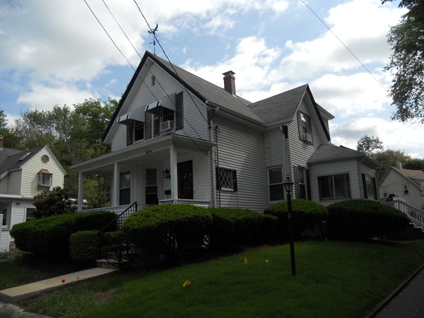 52 Malvern Road Brockton, MA 02301 - Photo 1 of 8 a front view of a house with a garden