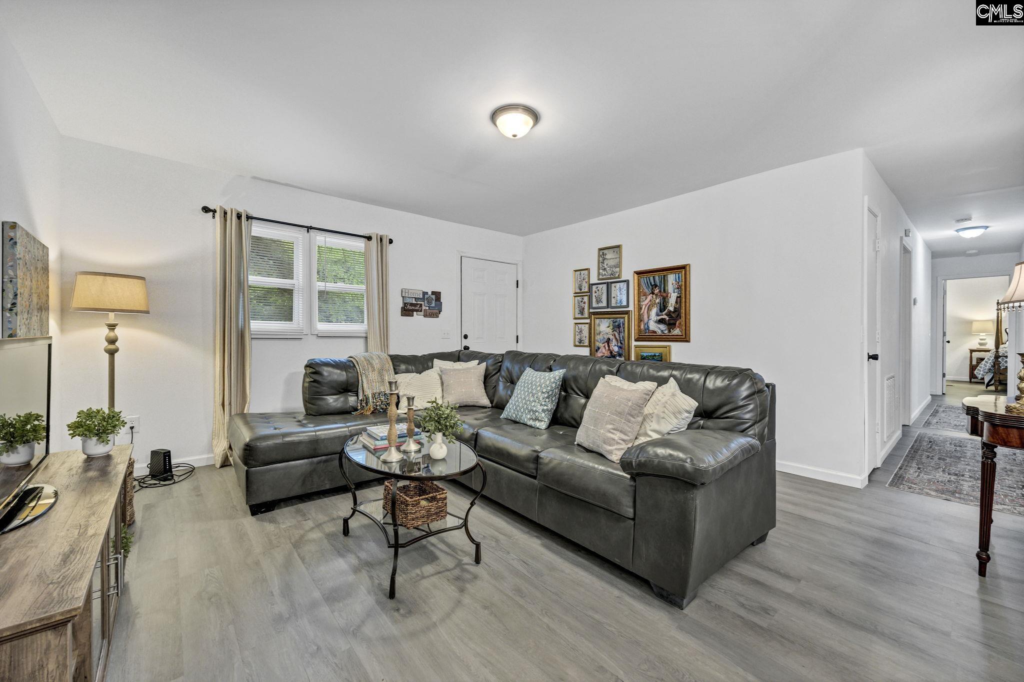 8107 Black River Road Rembert, SC 29128 - Photo 5 of 38 a living room with furniture