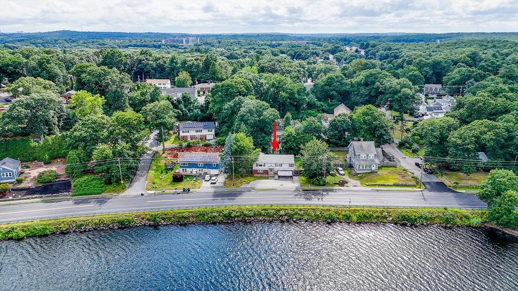 303 Walnut Street Saugus, MA 01906 - Photo 36 of 41 an aerial view of a house with outdoor space swimming pool and mountain view