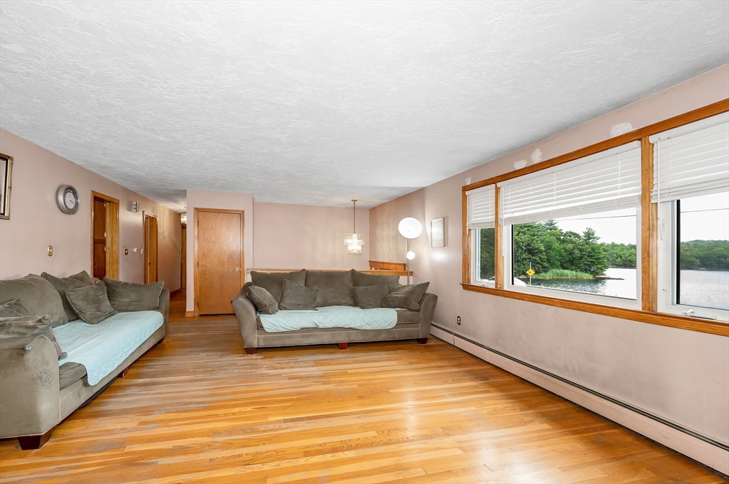303 Walnut Street Saugus, MA 01906 - Photo 4 of 41 a living room with furniture and a large window