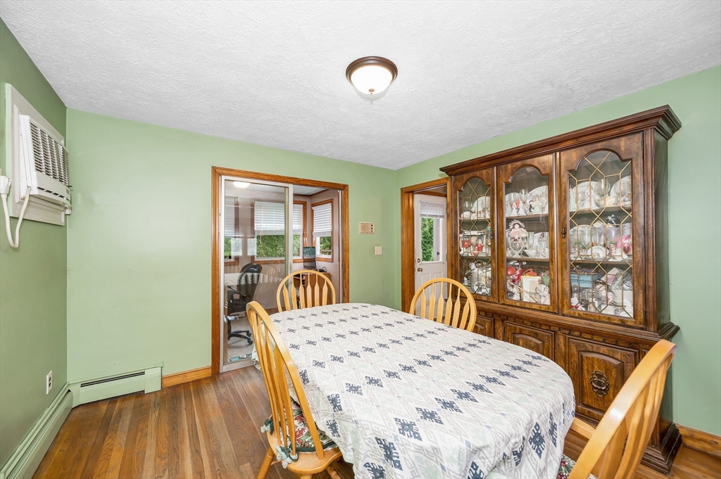 303 Walnut Street Saugus, MA 01906 - Photo 7 of 41 a bedroom with a bed and a large window