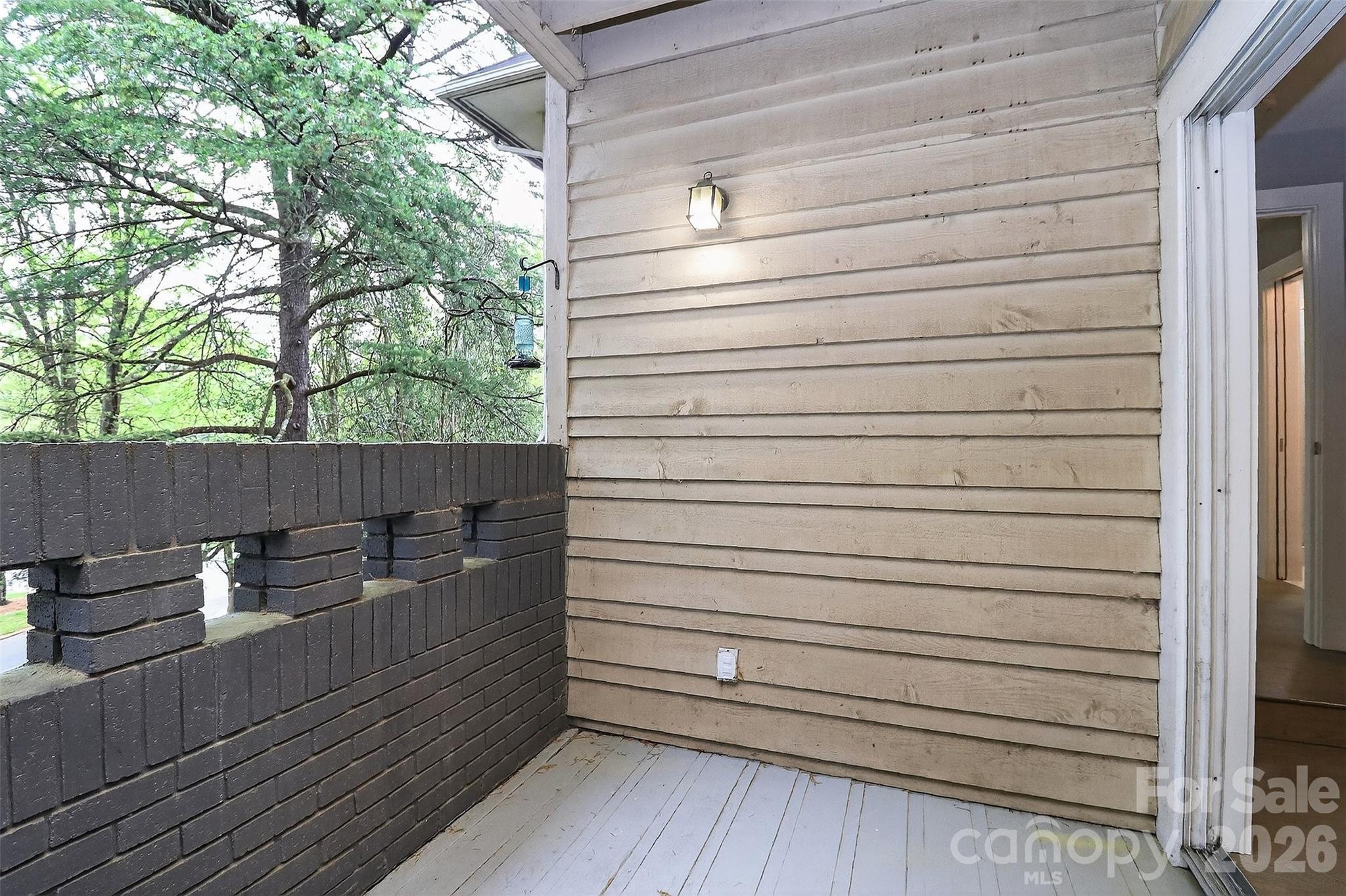 603 Queens Road, Unit B Charlotte, NC 28207 - Photo 17 of 33 a view of a house with a balcony