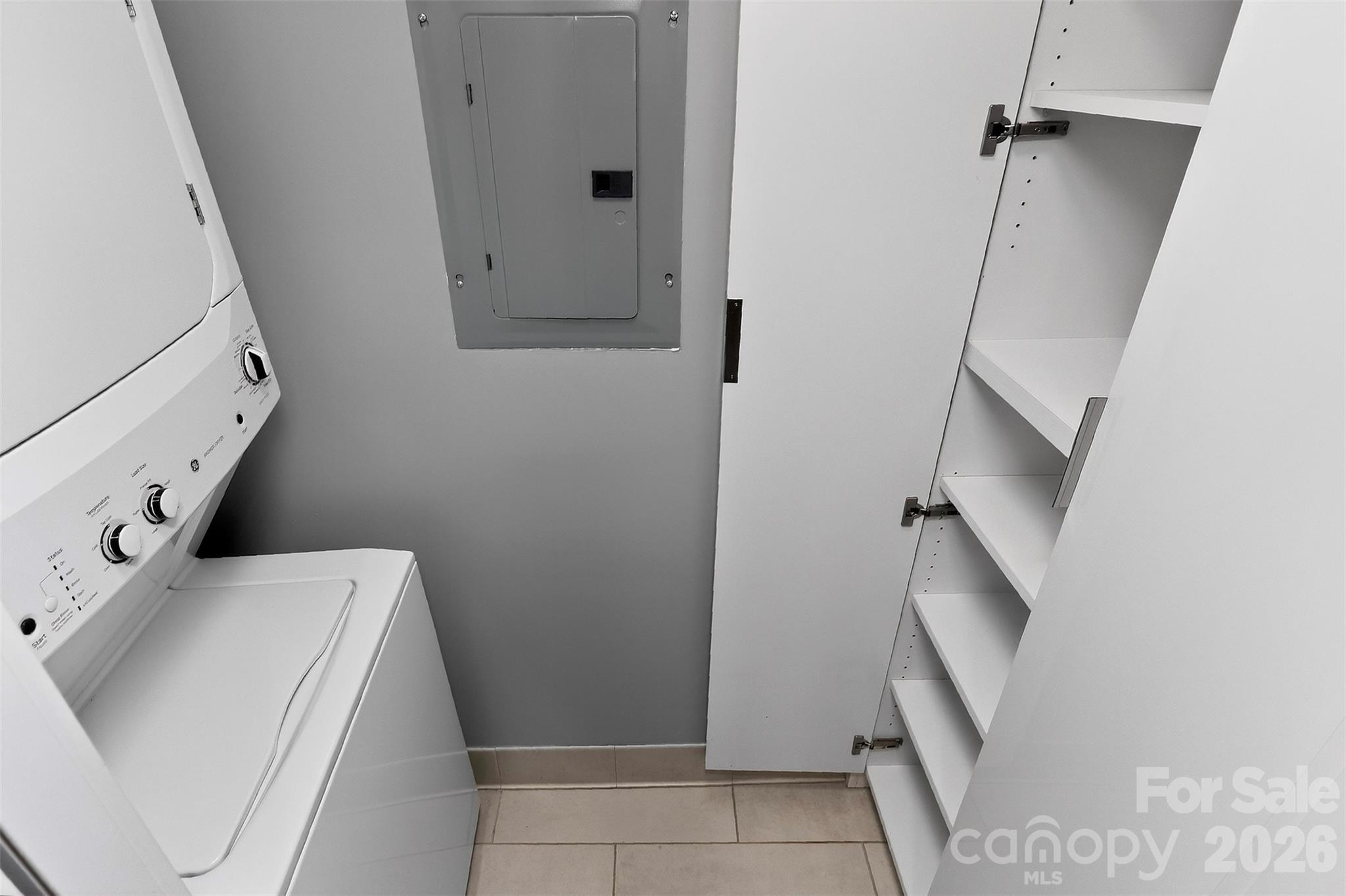 603 Queens Road, Unit B Charlotte, NC 28207 - Photo 9 of 33 a utility room with dryer and washer
