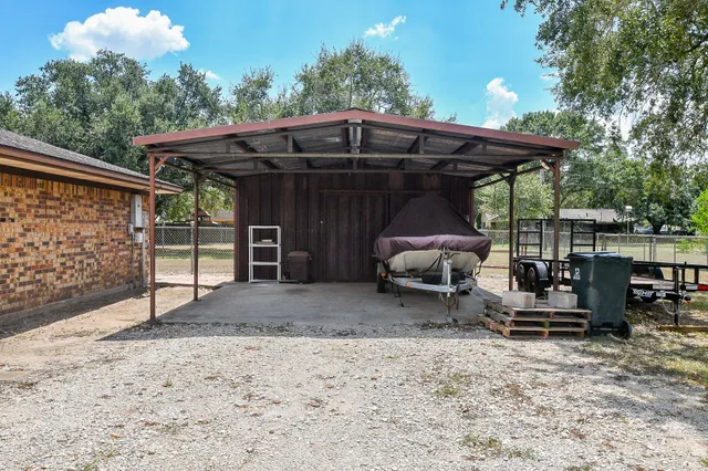 a view of backyard with cabin