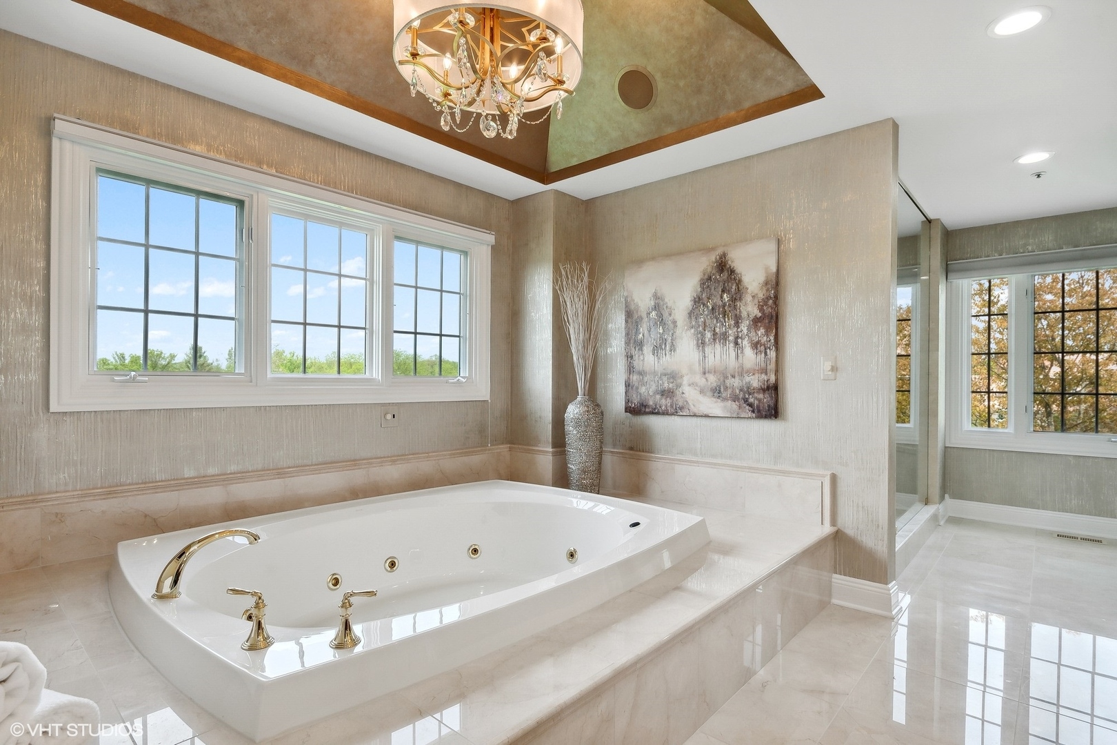 4454 Kettering Drive Long Grove, IL 60047 - Photo 23 of 49 a bathroom with a bathtub and a window