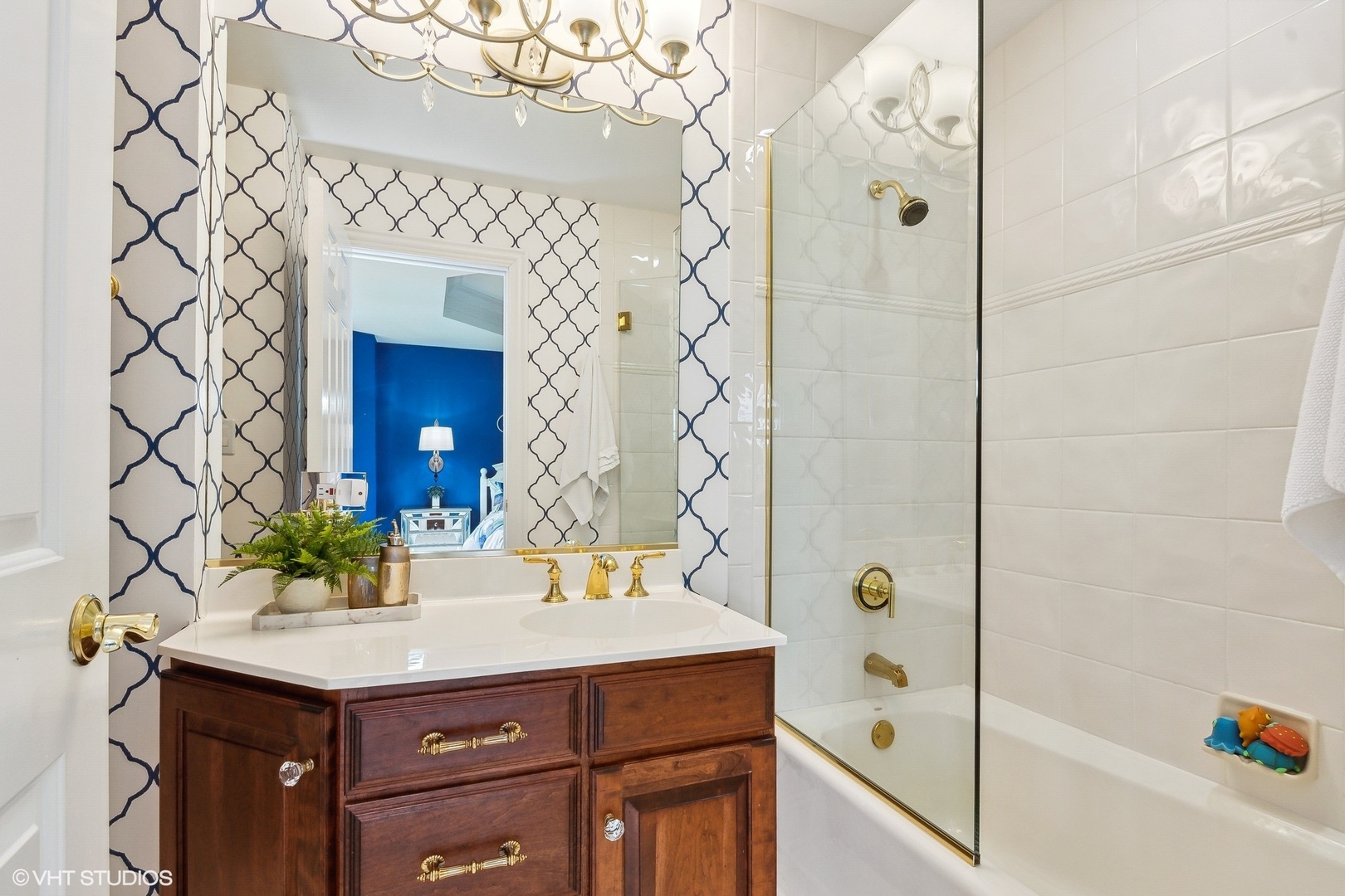4454 Kettering Drive Long Grove, IL 60047 - Photo 28 of 49 a bathroom with a sink and a mirror