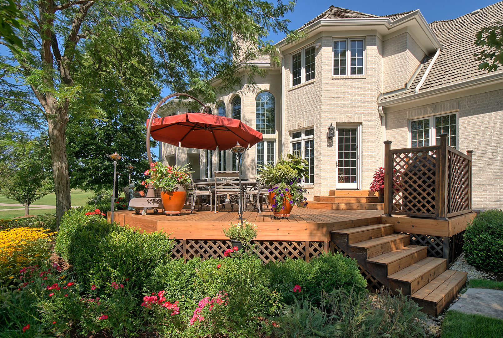 4454 Kettering Drive Long Grove, IL 60047 - Photo 41 of 49 an outdoor space with patio and white umbrellas