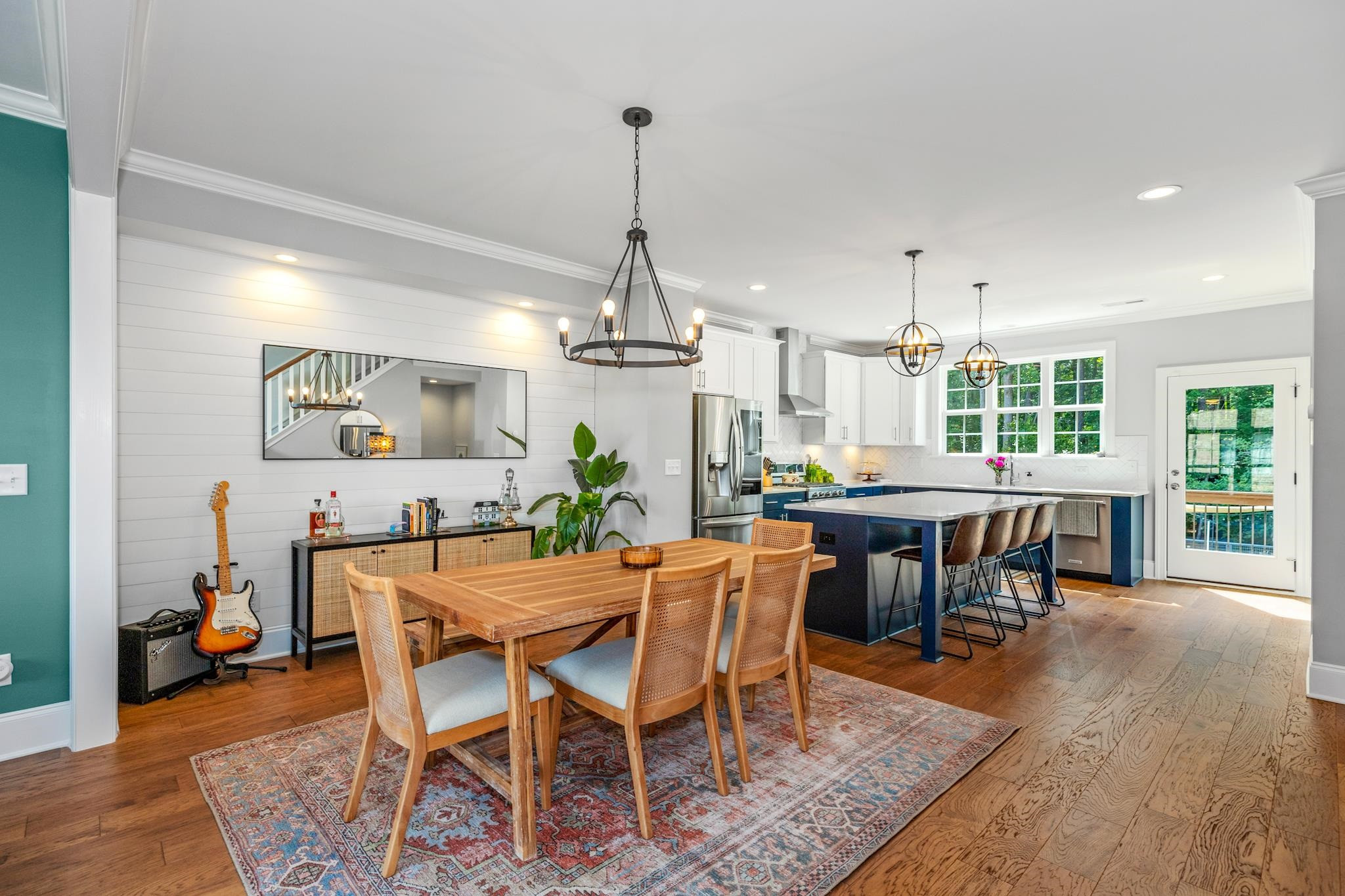 1611 Wooster Street Raleigh, NC 27607 - Photo 8 of 34 a view of a dining room with furniture window and wooden floor